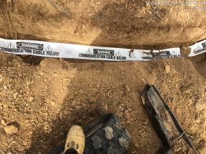 Canberra NBN Build showing warning tape over underground assets
